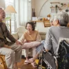 old-senior-asian-friends-retired-people-hapiness-positive-laugh-smile-conversation-together-living-room-nursing-home-seniors-participating-group-activities-adult-daycare-center